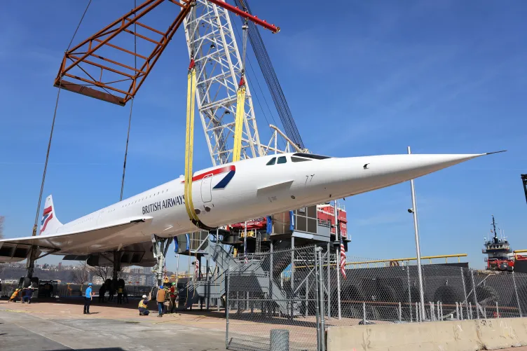 British Airways Concorde lifted by crane onto the Museum pier 86