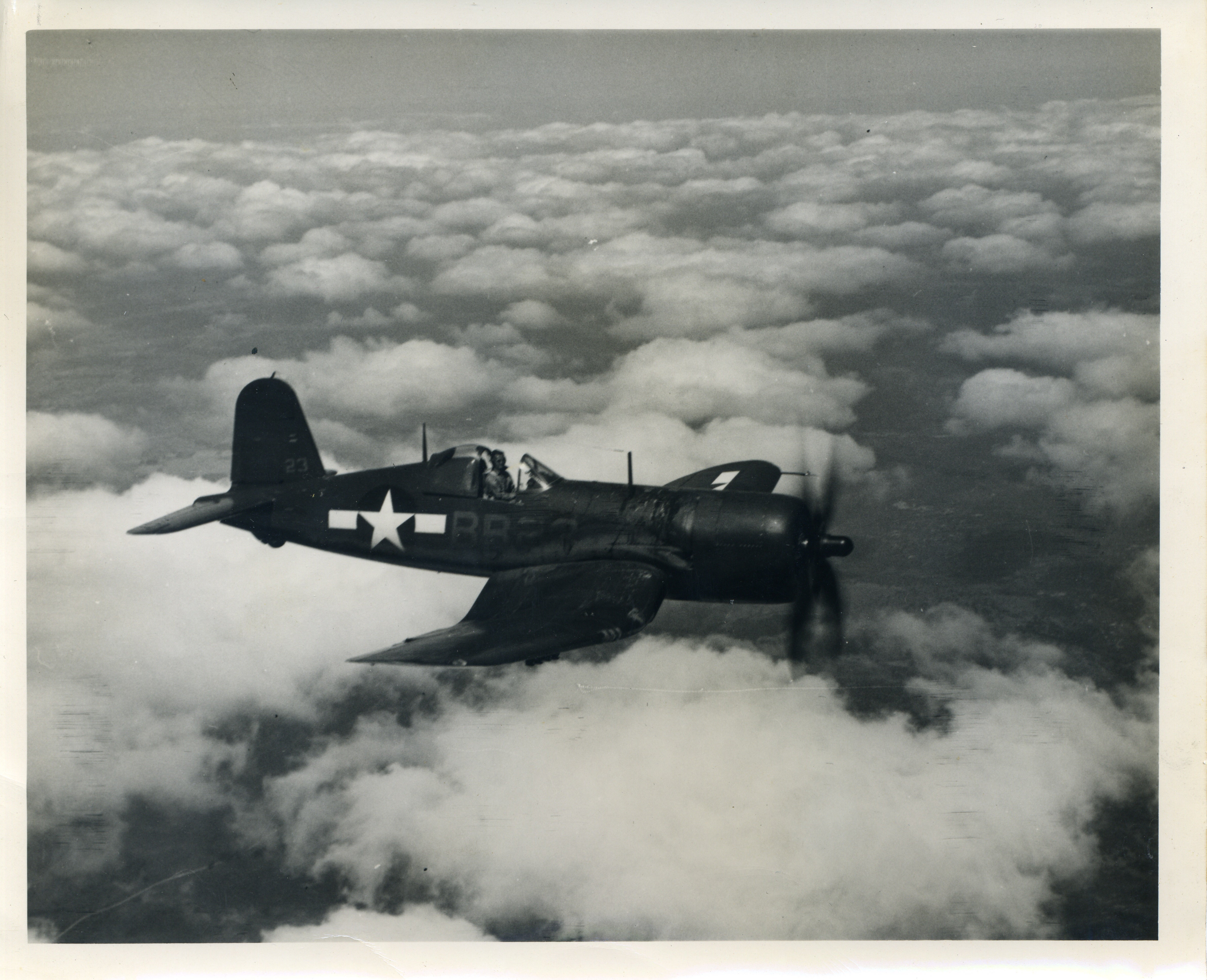 The F4U Corsair soaring through the skies.