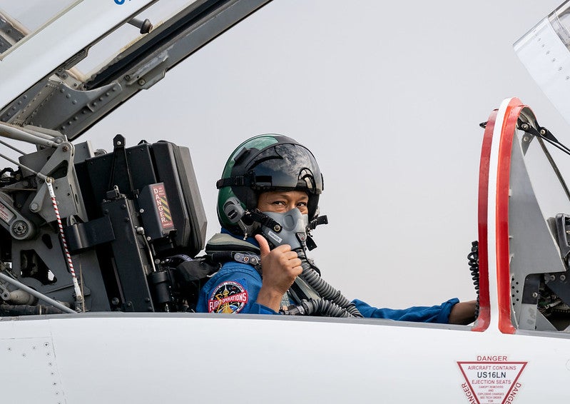 NASA astronaut and SpaceX Crew-8 Mission Specialist Jeanette Epps is seated inside a T-38 trainer jet at Ellington Field in Houston, Texas. Credit: NASA