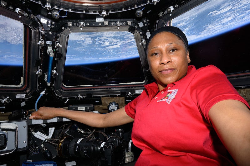 Expedition 71 Flight Engineer and NASA astronaut Jeanette Epps poses for a portrait inside the seven-window cupola, the International Space Station's "window to the world," while orbiting 259 miles above Greece in 2024. Credit: NASA.