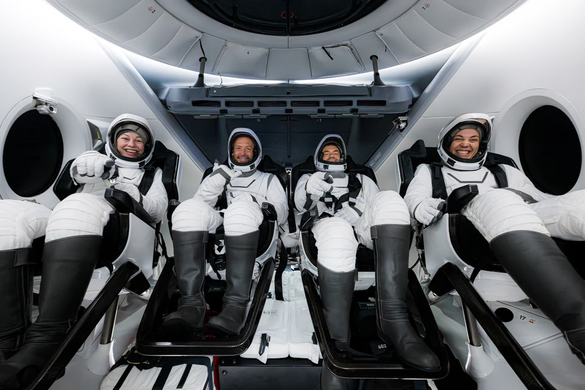 Polaris Dawn astronauts inside the Crew Dragon capsule. From left Anna Menon, Scott Poteet, Jared Isaacman, and Sarah Gillis. (Photo credit: John Kraus/Polaris Program)