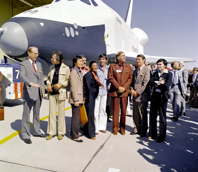 The cast of Star Trek greets the Space Shuttle Enterprise as it rolls out of the hangar. (Image credit: NASA | Chris Cohen).