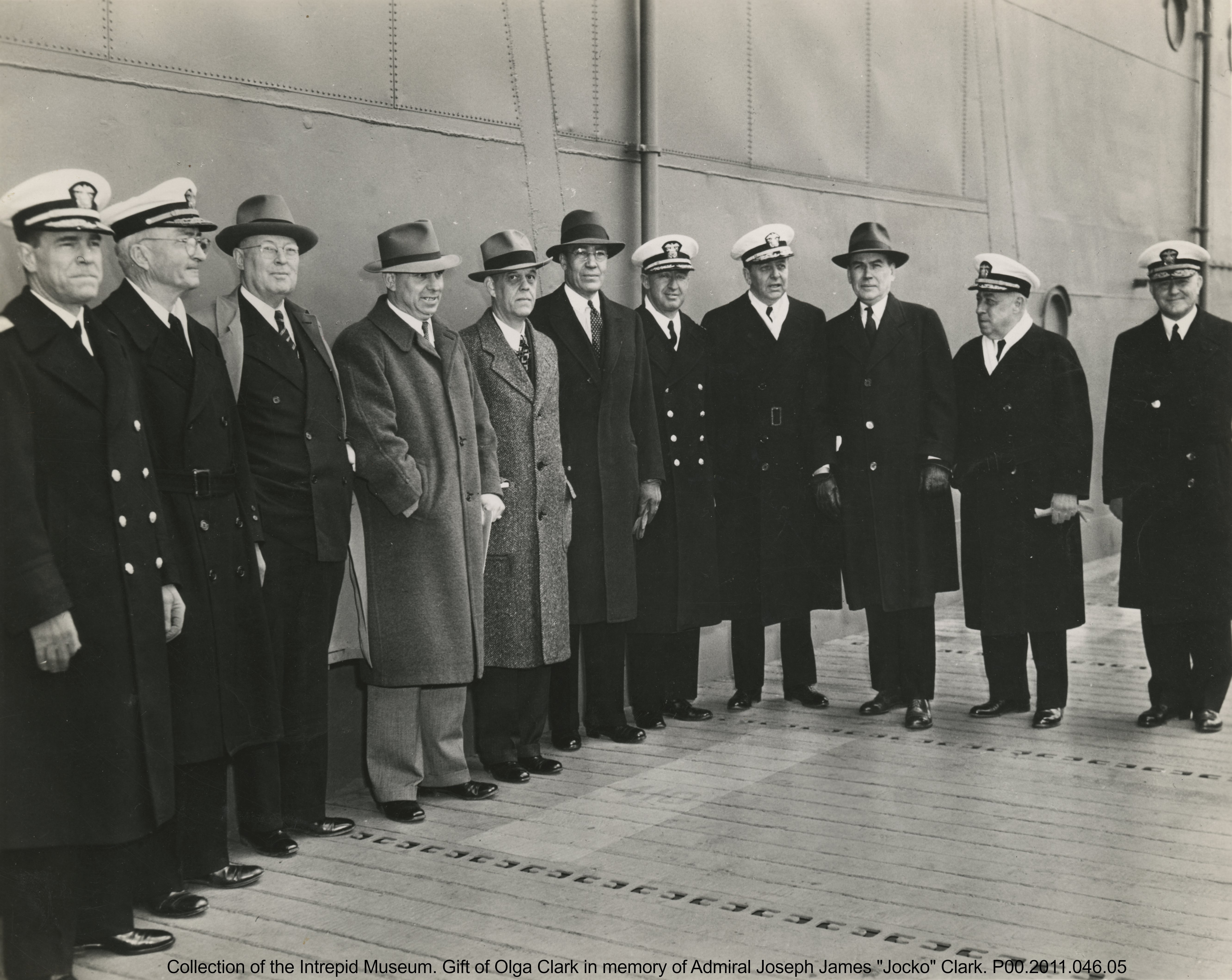 Clark, fifth from the right, and other officials at the commissioning of USS Yorktown in 1943. Alongside the admirals are two politicians from Clark’s home state: J.B. Milam, chief of the Cherokee Nation, and Wesley E. Disney, an Oklahoma congressman.