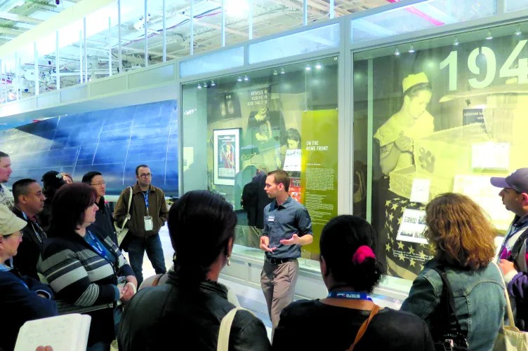 A tour guide with a group of visitors.