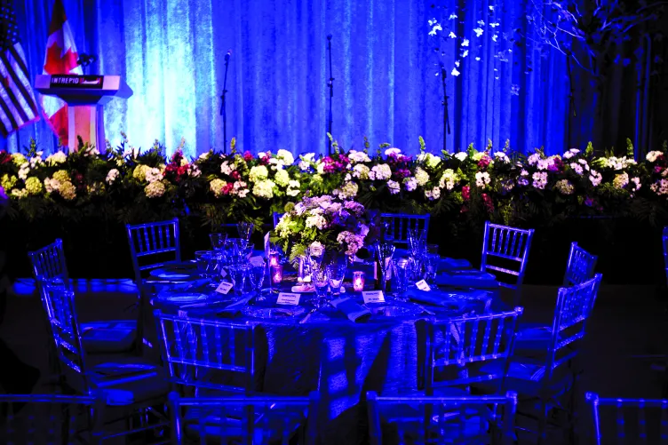 Round tables and chairs set up for an event