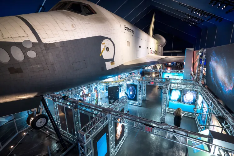 Enterprise in the Space Shuttle Pavilion with an exhibition underneath. 