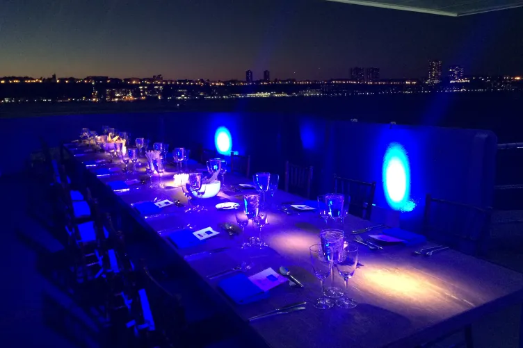 Tables set up for an event on the Fantail