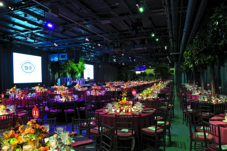 Round tables and chairs set up for an event