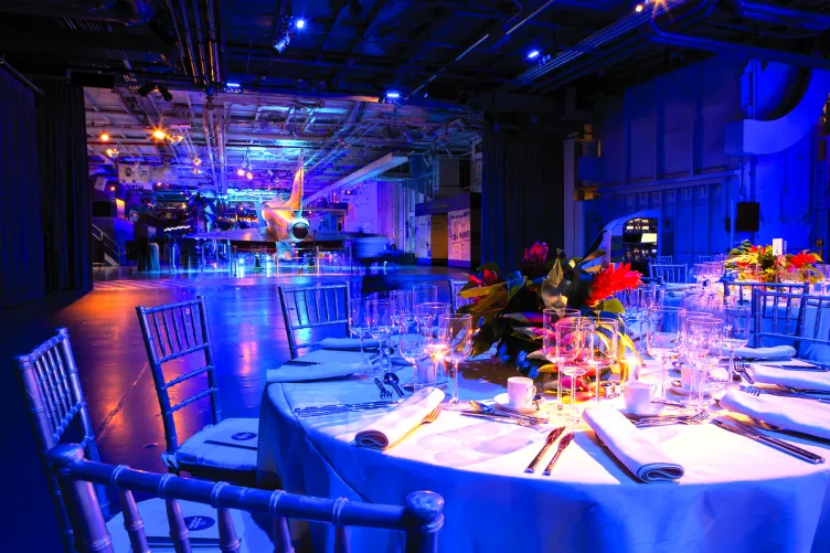 Round tables and chairs set up for an event