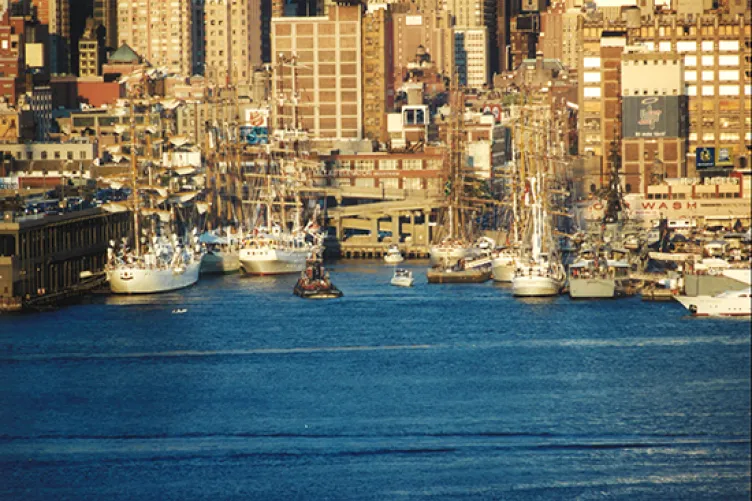 A group of boats on the water during OpSail 2000