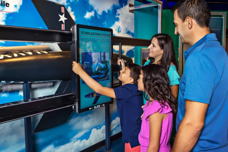 A family is looking at the Growler stabilization system