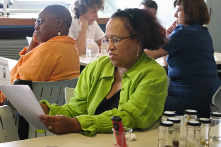 Educators review the results of their hands-on experiment at last year's Educator Open House