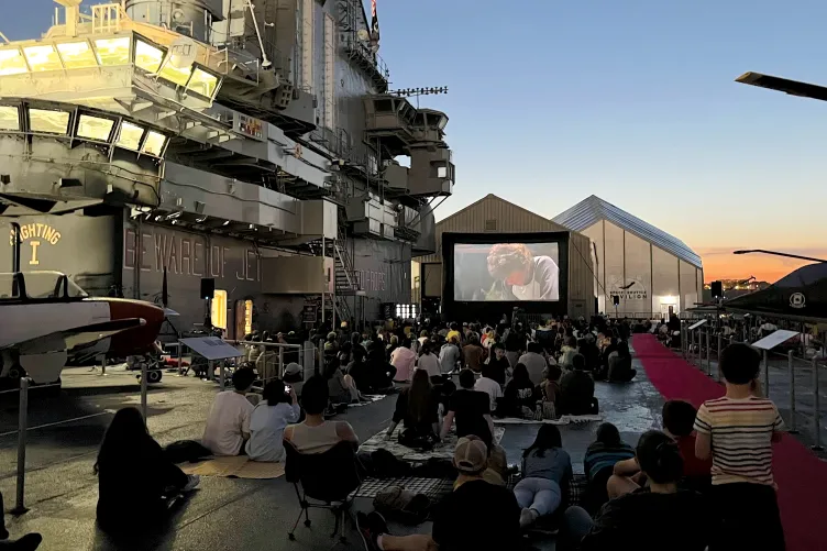 Image of crowd at the flight deck for movie night