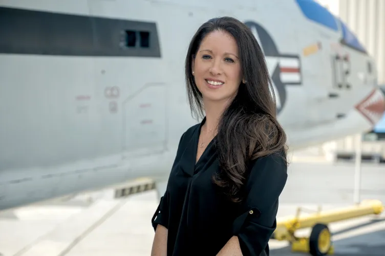 Photo of Desiree Siegel on Intrepid's flight deck.