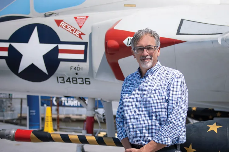 Photo of Eric Boehm on Intrepid's flight deck.