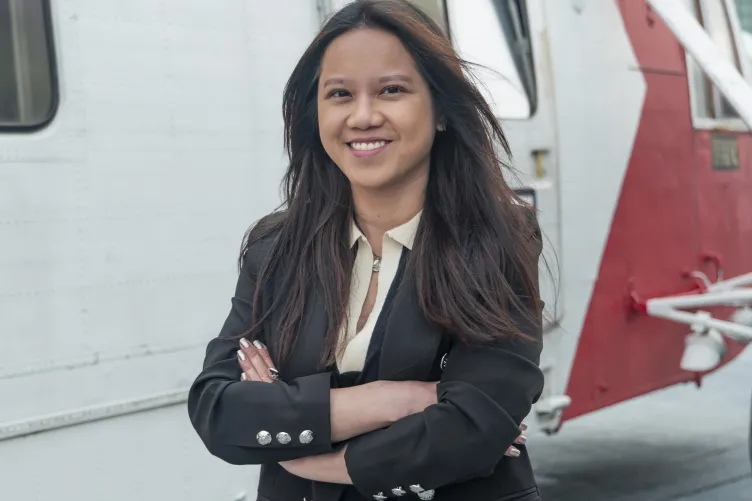 Photo of Mi Dan Nguyen on Intrepid's flight deck.