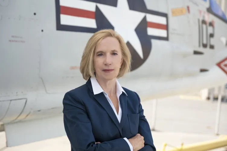 Headshot of Patricia Beene on the flight deck of Intrepid