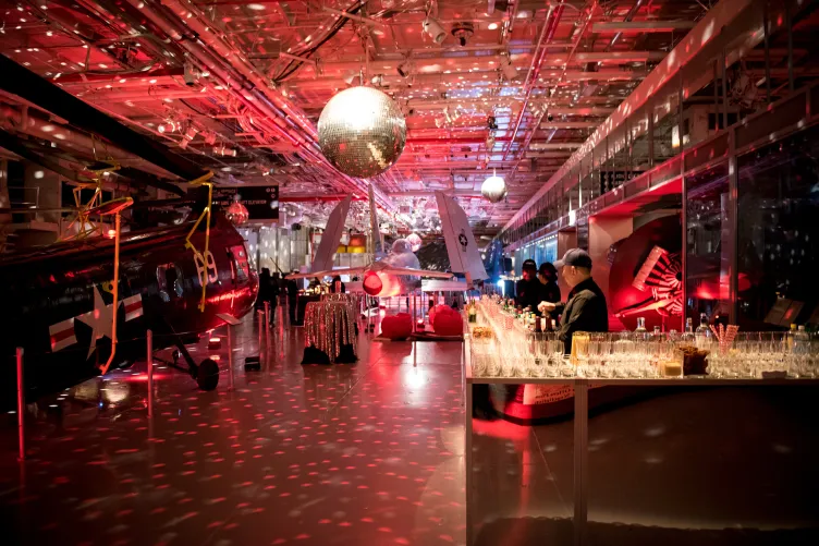 Bar and disco ball set up by the helicopter at hanger 2