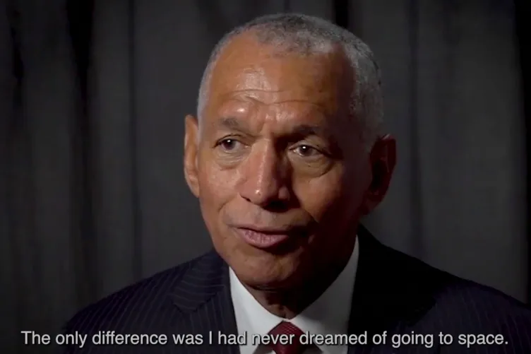 Charles Bolden, former NASA Administrator, wearing a suit and tie