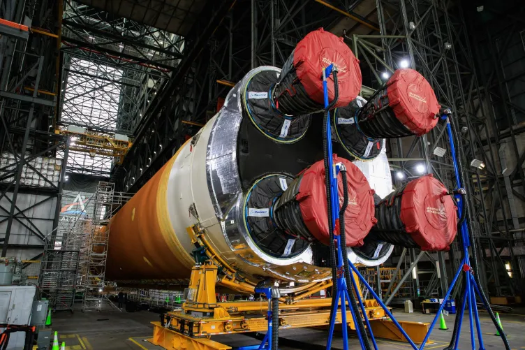 The Space Launch System (SLS) core stage for NASA’s Artemis I mission is in the transfer aisle of the Vehicle Assembly Building at Kennedy Space Center.