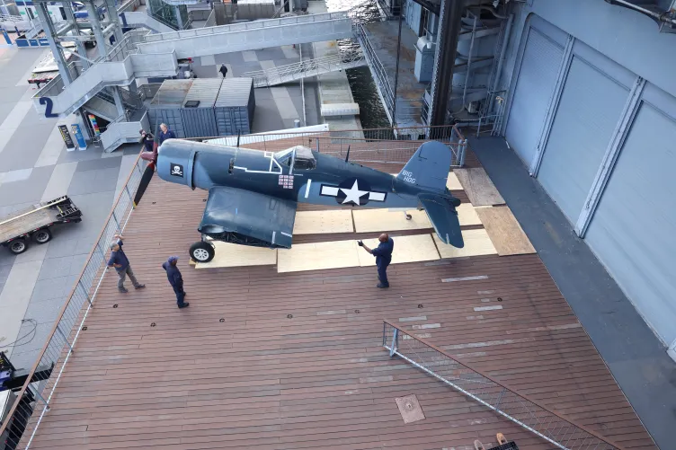 Corsair aircraft positioned on the Port Side Aircraft Elevator at Pier 86, Intrepid Museum.