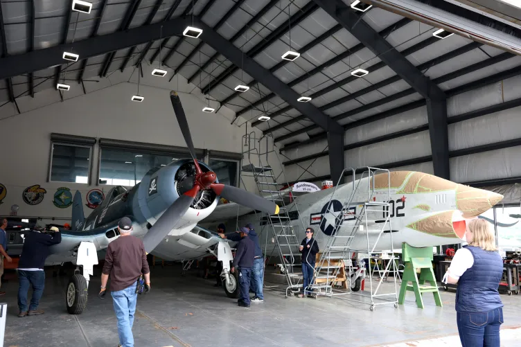 Corsair aircraft inside the aircraft restoration tent at the Intrepid Museum