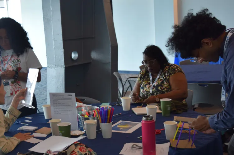 Educators participating in an interactive workshop at the Intrepid Museum