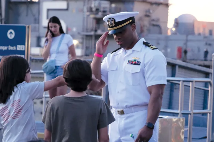 Visitors participating in Fleet Week activities on Pier 86 at the Intrepid Museum