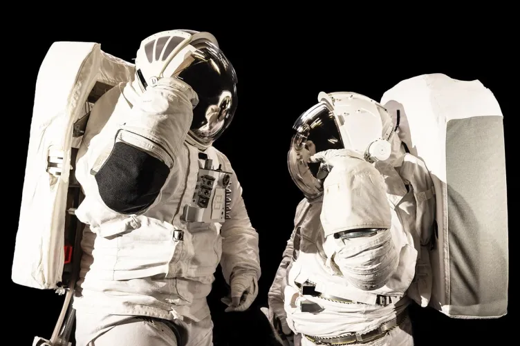 Two astronauts in space suits