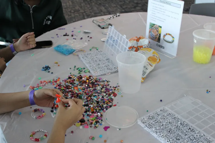Teens engaged in an arts and crafts activity
