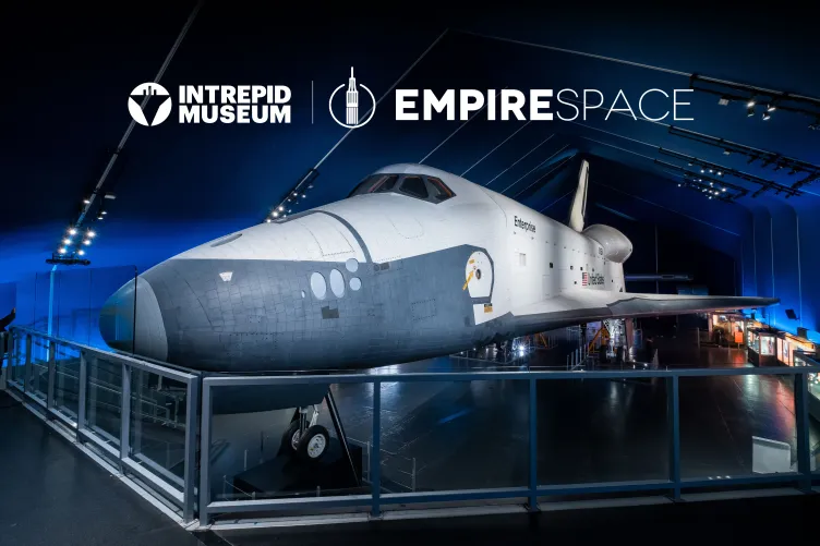 Space shuttle Enterprise inside the Museum’s Space Shuttle Pavilion with Empire Space and Intrepid Museum logos overlaid.