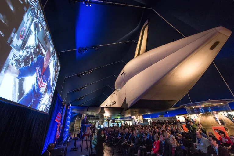 Crowd at an event in the Space Shuttle Pavilion