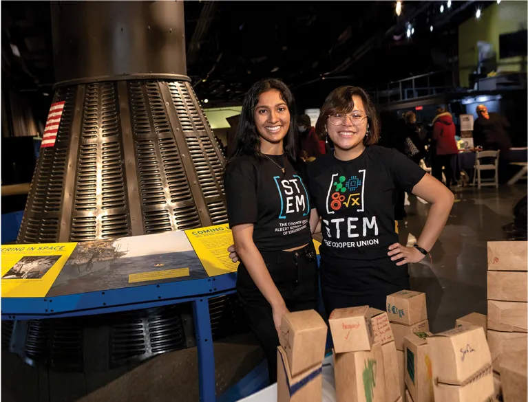 Two girls participating on a STEM program
