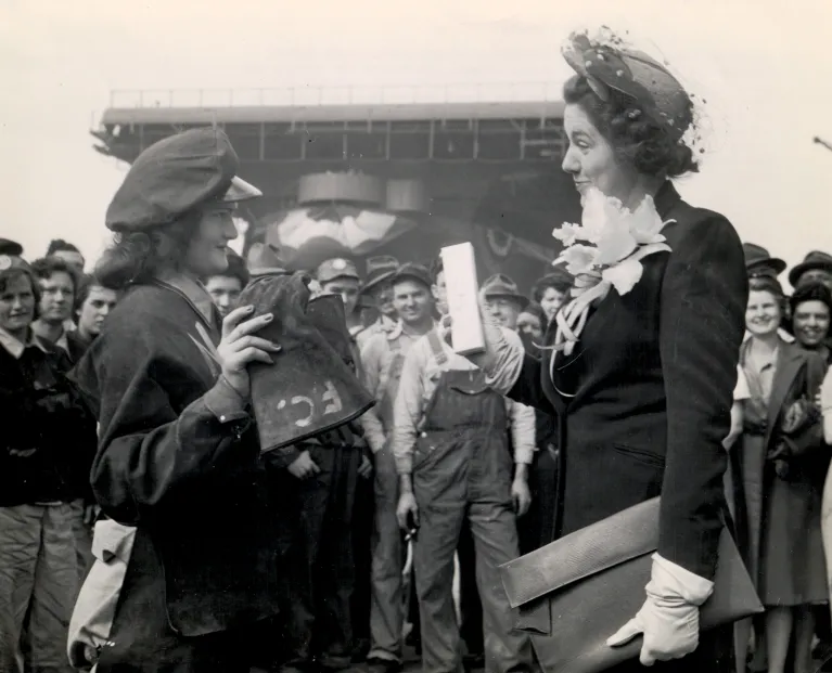 Photo on April 26, 1943, christening of the new aircraft carrier Intrepid are Mrs. John Howard Hoover (right) and Miss Berline F. Cashwell 