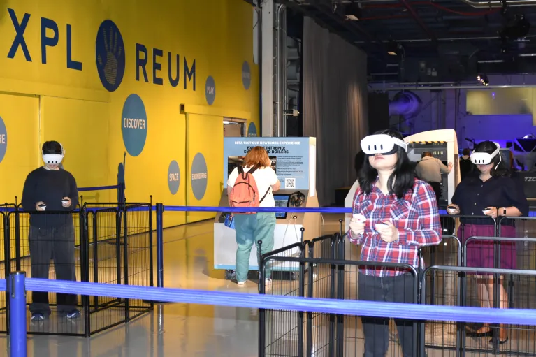 Visitor using virtual reality headset in the Intrepid Museum's Engine Room VR Experience
