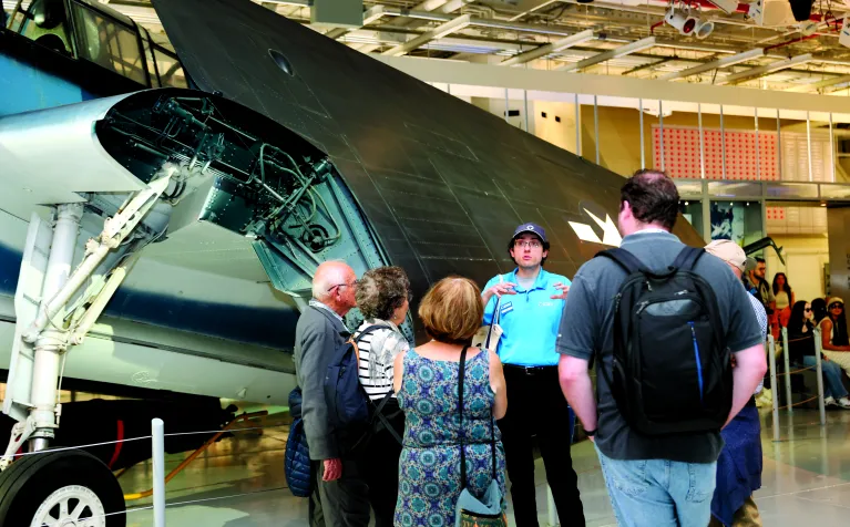 Guests on a tour of the Intrepid Museum.