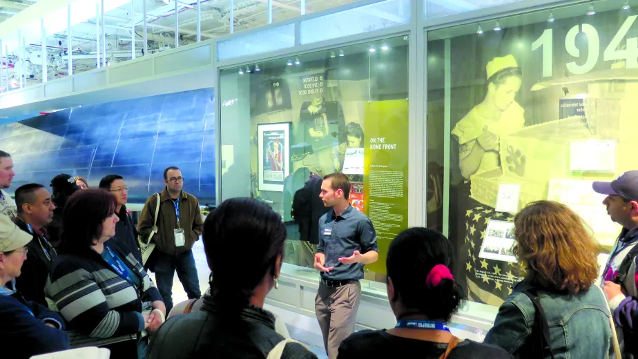 A tour guide with a group of visitors.