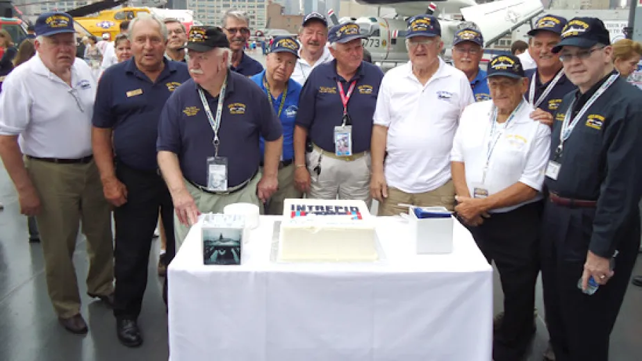Intrepid’s former crewmembers and their anniversary cake