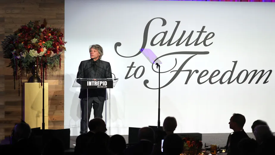 Jon Bon Jovi at the stage at the 2021 Salute to Freedom event, addressing guests.