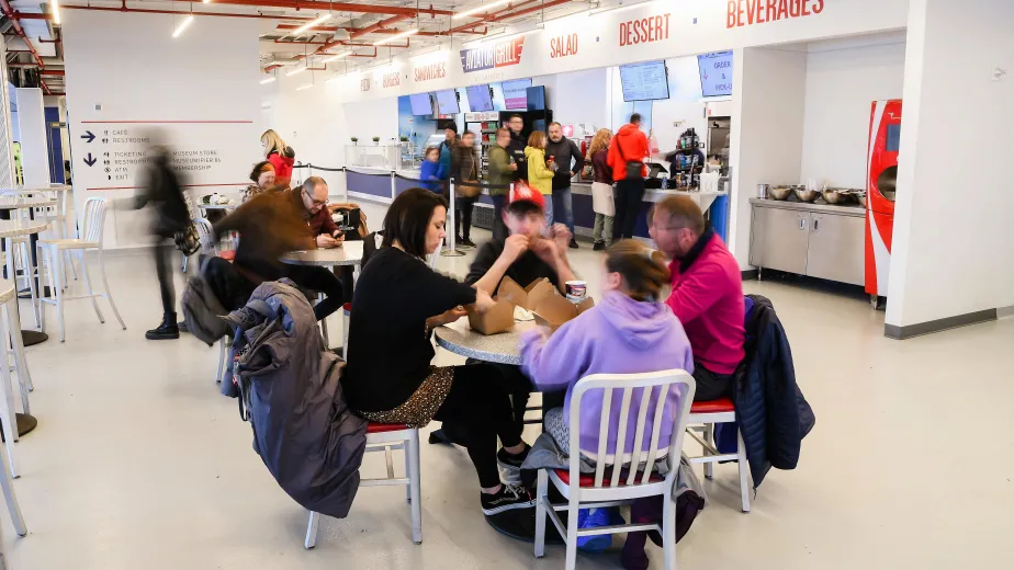 Museum visitors are eating in the Aviator Grill.