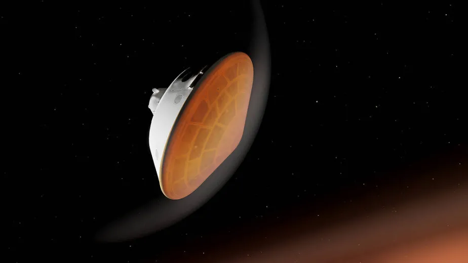 A round spacecraft against a starry sky, approaching an orange mass. The bottom of the spacecraft is orange and surrounded by a white semicircle.