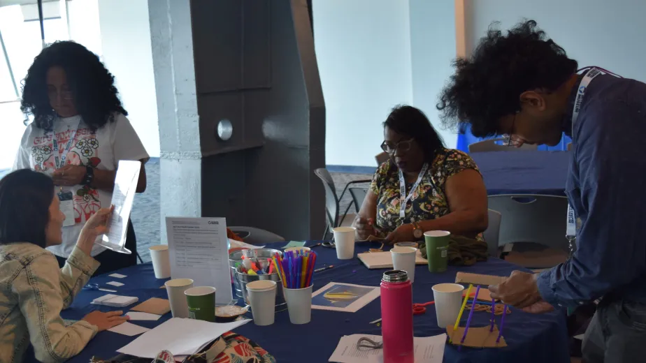 Educators participating in an interactive workshop at the Intrepid Museum