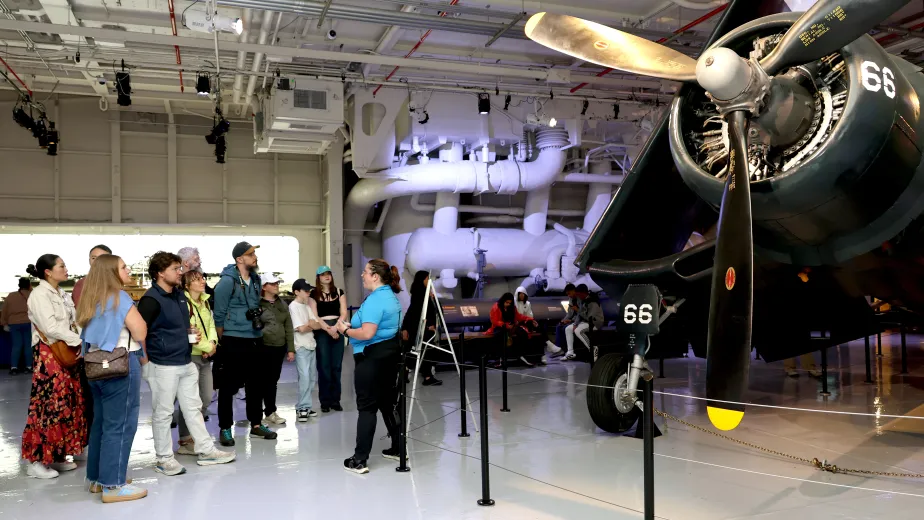 Guests on a highlight tour of the Intrepid Museum.
