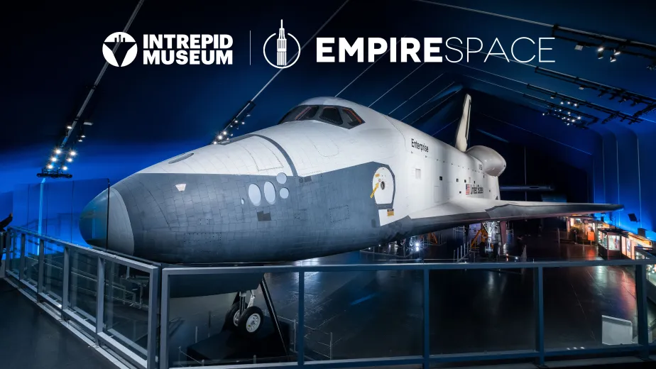 Space shuttle Enterprise inside the Museum’s Space Shuttle Pavilion with Empire Space and Intrepid Museum logos overlaid.